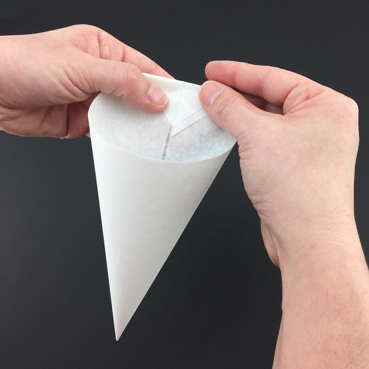 To pipe fine detail onto your treats, make a pastry cone using ordinary  kitchen parchment paper!